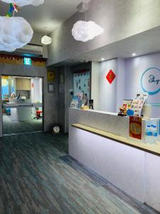 Lobi atau kawasan kaunter penerimaan di 西門雲町旅店 Sky Gate Hotel