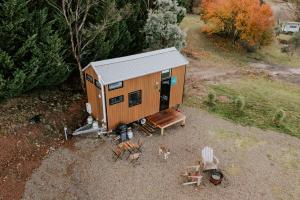 an overhead view of a tiny house with a bench at Little Baxter in Collector