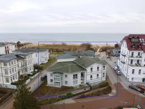 an aerial view of a city with houses and the ocean at Haus Meerblick - 12 in Ahlbeck