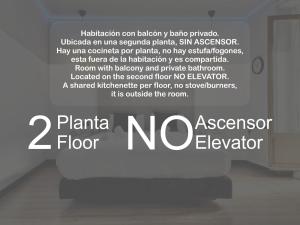 a sign that says no accessory elevator on a wall at Royal Suites Madrid in Madrid