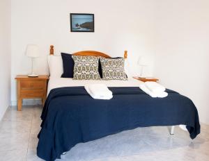 Postel nebo postele na pokoji v ubytování Apartamentos Salceda