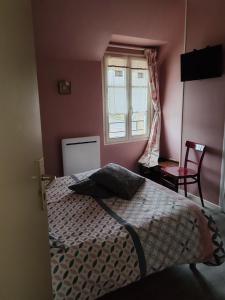 Postel nebo postele na pokoji v ubytování Ma Gentilhommière
