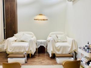 Posezení v ubytování Four Sisters Homestay