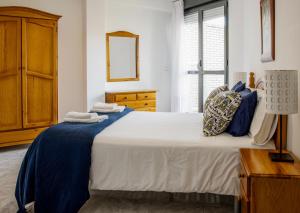 Postel nebo postele na pokoji v ubytování Apartamentos Salceda