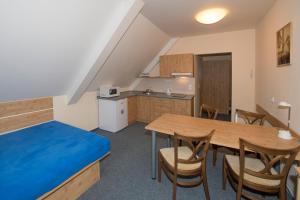 Kuchyňa alebo kuchynka v ubytovaní Horský Hotel Skiland