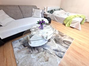 Posteľ alebo postele v izbe v ubytovaní ApartHouse Apartamenty Centrum