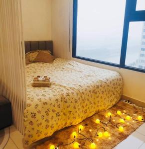 a bedroom with a bed with lemons on it at Homestay Vinhome Ocean Park S201 in Hanoi +7 photos