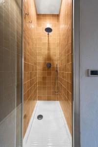 a bathroom with a shower with a shower at Villa Flavia in Manziana