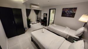 Voodi või voodid majutusasutuse Helio Cairo Hotel toas