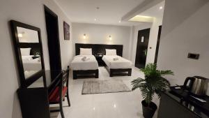 Voodi või voodid majutusasutuse Helio Cairo Hotel toas