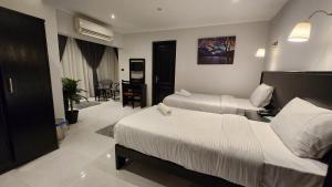Voodi või voodid majutusasutuse Helio Cairo Hotel toas