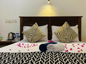 Letto o letti in una camera di Lucky Villa Sigiriya