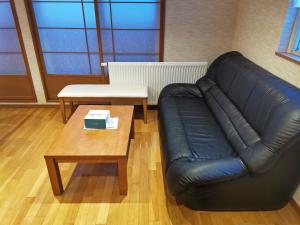 Posezení v ubytování White House Guesthouse