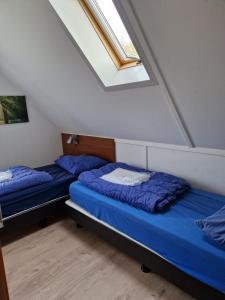 Postel nebo postele na pokoji v ubytování Recreatiepark De Tien Heugten + 66 fotografií