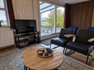 Posezení v ubytování Recreatiepark De Tien Heugten