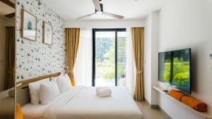 Katil atau katil-katil dalam bilik di Cassia Residences