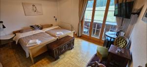 Postel nebo postele na pokoji v ubytování Miramont Horse Trekking Hostel