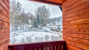 Apartament Cicha 11 VIP z JACUZZI, SAUNĄ i ogrodem by Royal Aparts iarna