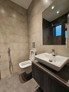 Koupelna v ubytování Hotel Kumkum