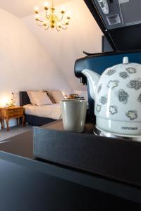 Ein Sitzbereich in der Unterkunft Li Ter Hôtel