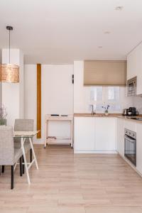 Küche/Küchenzeile in der Unterkunft Chueca I calle Farmacia 1BR 1BH