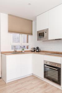 Küche/Küchenzeile in der Unterkunft Chueca I calle Farmacia 1BR 1BH