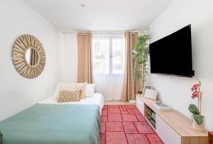 TV/Unterhaltungsangebot in der Unterkunft Chueca I calle Farmacia 1BR 1BH