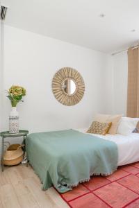 Ein Bett oder Betten in einem Zimmer der Unterkunft Chueca I calle Farmacia 1BR 1BH