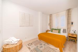 Ein Sitzbereich in der Unterkunft Chueca I calle Farmacia 1BR 1BH