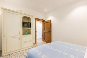 A bed or beds in a room at Terrazza e Conchiglie