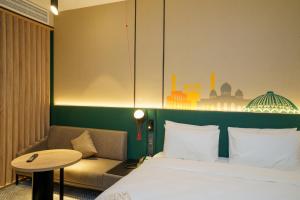 Postelja oz. postelje v sobi nastanitve Holiday Inn Tashkent City, an IHG Hotel