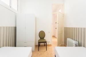 Postel nebo postele na pokoji v ubytování Apartament Clot 1
