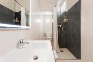 Koupelna v ubytování Apartament Clot 1