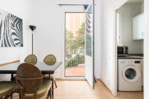 Kuchyň nebo kuchyňský kout v ubytování Apartament Clot 1