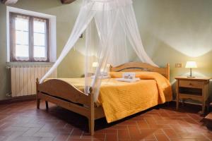 Postel nebo postele na pokoji v ubytování Borgo Poneta + 37 fotografií
