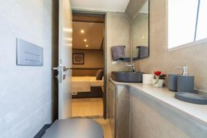 a bathroom with two sinks and a bedroom at Explorer Yacht in Fethiye