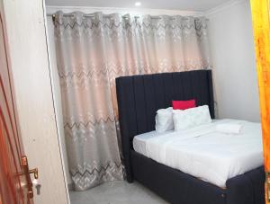 Postel nebo postele na pokoji v ubytování TYGAJ HOME