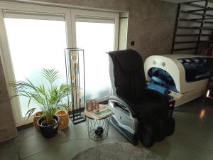 Posezení v ubytování L'écurie gîte duplex Welness