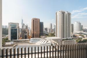 a view of a city skyline with buildings at Colony by Infinitum - 10mins to LRT Station in Kuala Lumpur