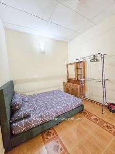 Un ou plusieurs lits dans un hébergement de l'établissement Homestay Habib