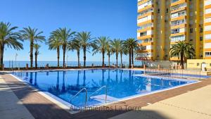 Bazén v ubytování Algarrobo Beach Holidays - Alojamientos La Torre nebo v jeho okolí
