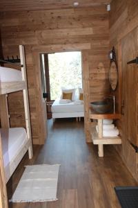 Łóżko lub łóżka w pokoju w obiekcie Villa Forêt et Spa