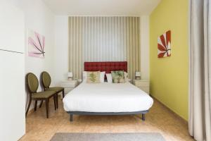 Postel nebo postele na pokoji v ubytování Apartament Clot 1