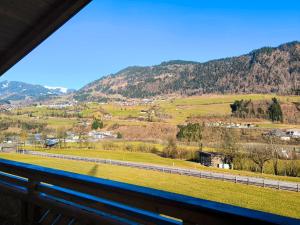 a view of a mountain from a train window at Bauernhof Sonnenhuab in Sankt Veit im Pongau