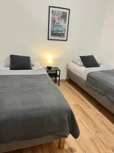เตียงในห้องที่ Apartment Central 10A 40qm Wi-Fi free Parking calm back house