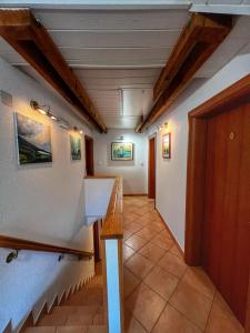 a hallway with a staircase in a house at Villa Lykos Plitvice in Plitvička Jezera