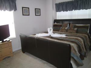 Ein Bett oder Betten in einem Zimmer der Unterkunft Private Pool Homes