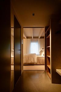 Letto o letti in una camera di Hotel Vyn