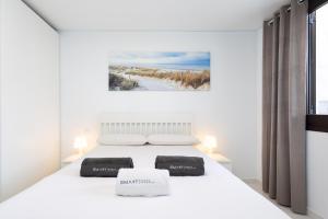 Llit o llits en una habitació de Nice apartment in the heart of Las Americas