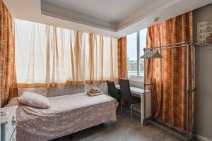 Ένα ή περισσότερα κρεβάτια σε δωμάτιο στο 22 Avenida de los Pueblos
